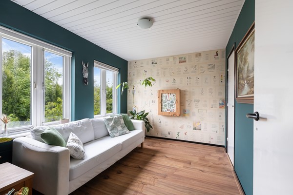 Foto - Te koop: Sfeervolle tussenwoning met groene oase!